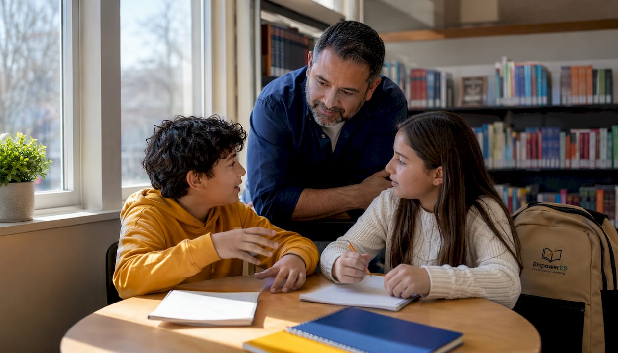 Middle school teacher observing Think-Pair-Share